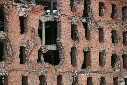 building ruins, brick wall, broken windows, human tragedy concept © mrivserg