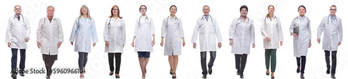 group of doctors in motion isolated on white