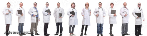 full length group of doctors with notepad isolated