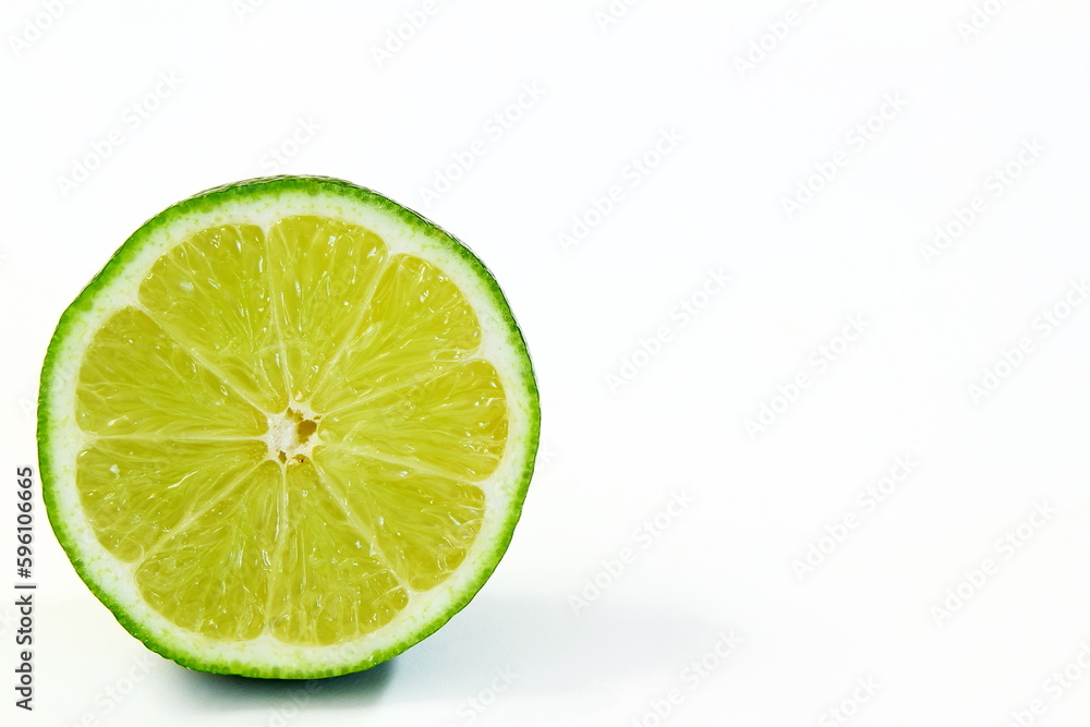 fresh cut lemon lime citrus fruit in white background