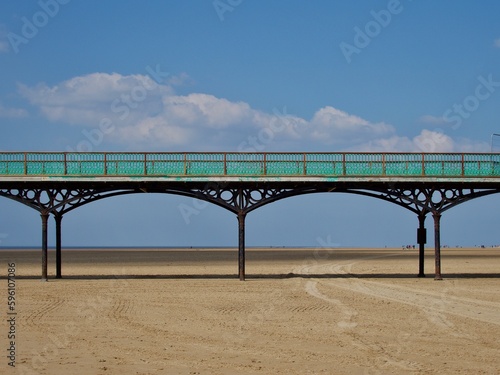 Victorian Pier on Sandy Beach © Pefkos