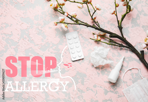 Nasal drops with pills, blooming tree branch, medical mask and tissue on grunge background. Seasonal allergy concept