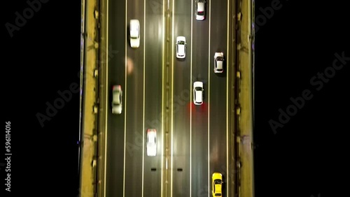 Drone - Bosphorus Bridge, Istanbul, Turkey 2023 - flynig down the bridge looking down at the cars and looking up to reveal the city and road ahead photo