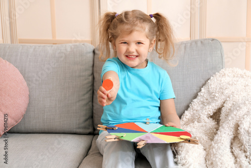 Cute little girl with match...