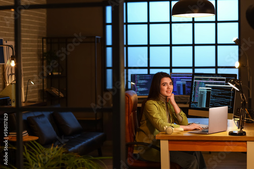 Young female programmer wor...
