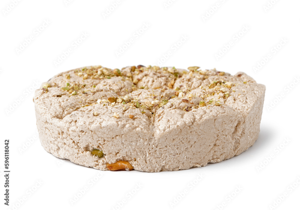 Tasty Tahini halva with pistachios on white background Tasty Tahini halva with pistachios on white background