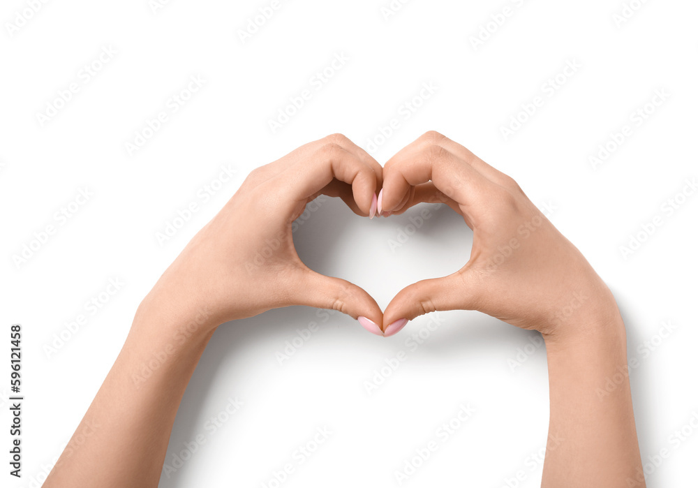 Woman making heart with her hands on white background Woman making heart with her hands on white background