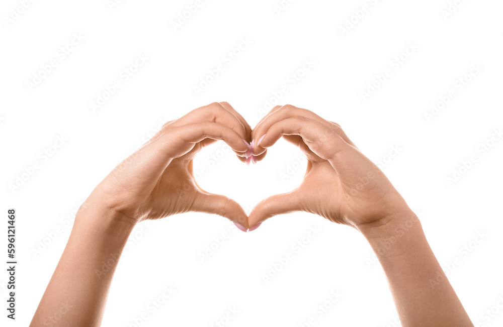 Fototapeta premium Woman making heart with her hands on white background