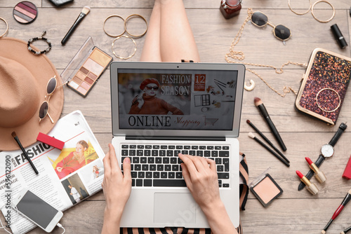 Woman with laptop, makeup p...