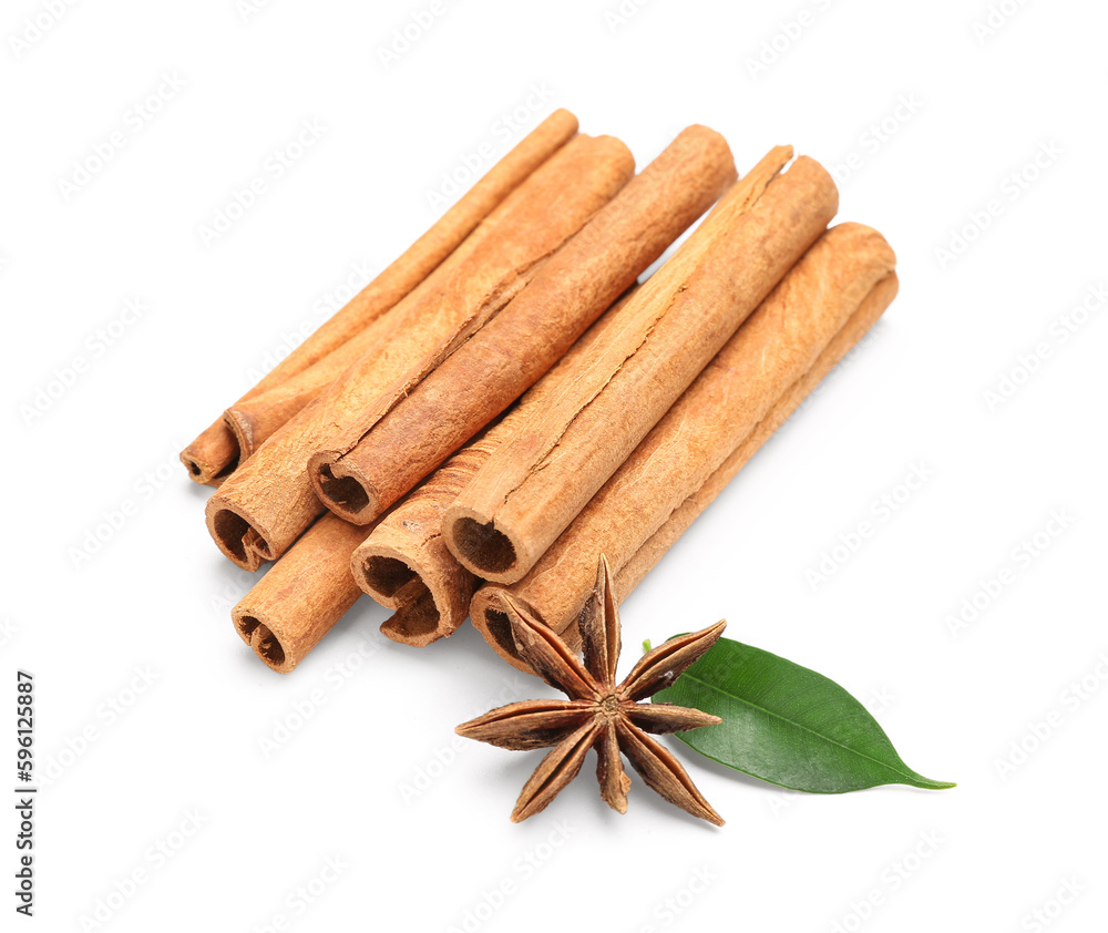 Cinnamon sticks with anise and leaf on white background Cinnamon sticks with anise and leaf on white background