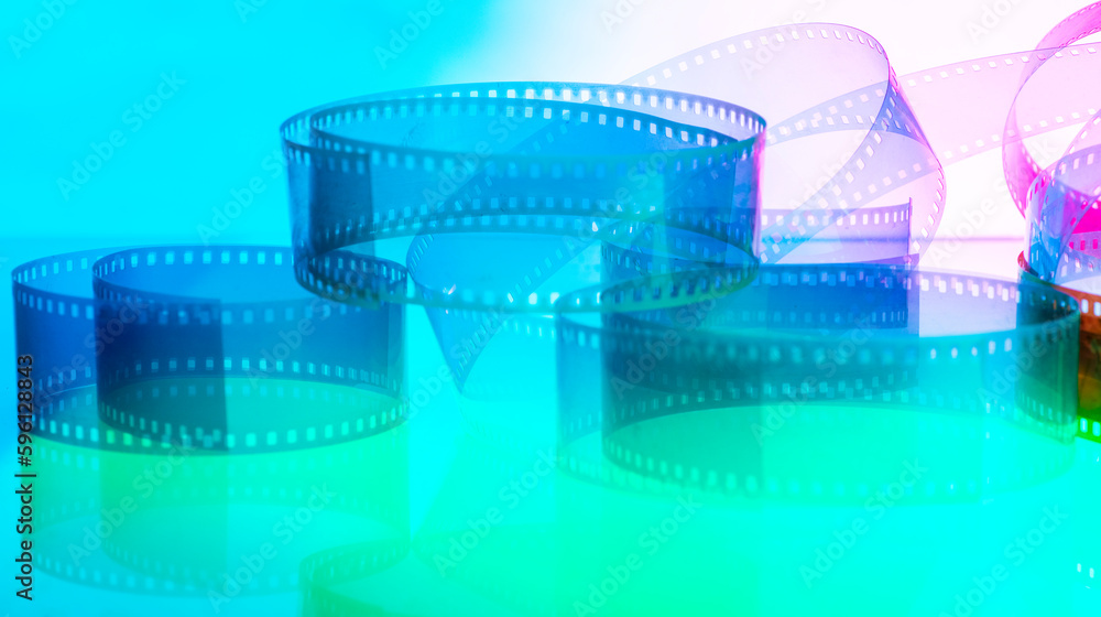 multicolored background with film strip. cinematography film production film industry film festival concept