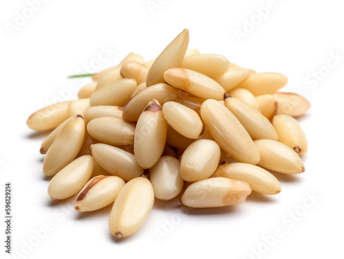 A pile of pine nuts on a white background.