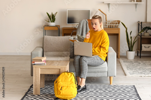 Female student studying onl...