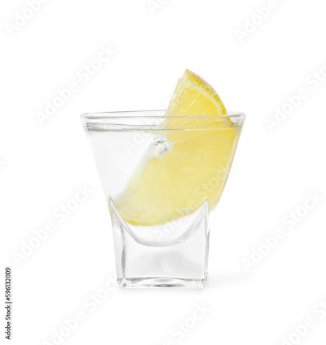 Shot glass of vodka with lemon isolated on white