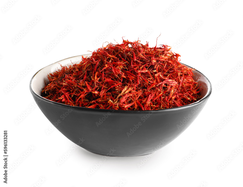 Fototapeta premium Bowl with Pile of saffron on white background