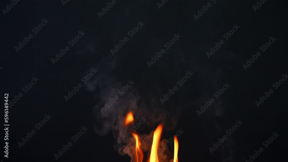 Fire flame and smoke slow motion on black screen background Fire flame and smoke slow motion on black screen background
