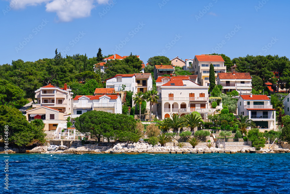 Trogir town panoramic view. UNESCO world heritage site panoramic view in Dalmatia, Croatia, tourist destination. View of sea coast in Trogir town with colorful houses