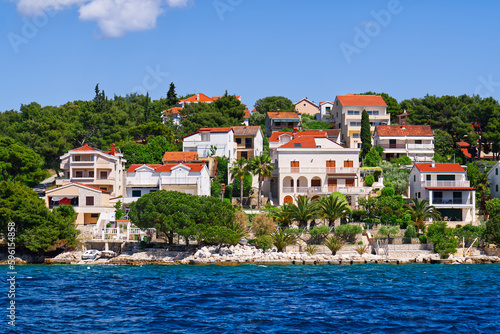 Trogir town panoramic view. UNESCO world heritage site panoramic view in Dalmatia, Croatia, tourist destination. View of sea coast in Trogir town with colorful houses