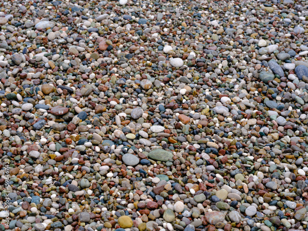 colorful pebbles on the beach colorful pebbles on the beach
