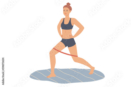 Woman does lunges with a rubber loop resistance band. Exercises for the legs and buttocks at home.