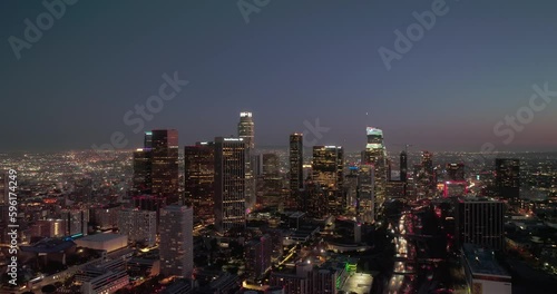 Wallpaper Mural Scenic aerial view of skyscrapers in Los Angeles city at night. Illuminated buildings in Los Angeles skyline, Aerial drone shot, Los Angeles, California. Skyline towers in LA. Torontodigital.ca