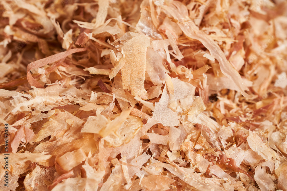 dry bonito fish flake katsuobushi texture background. close up dry