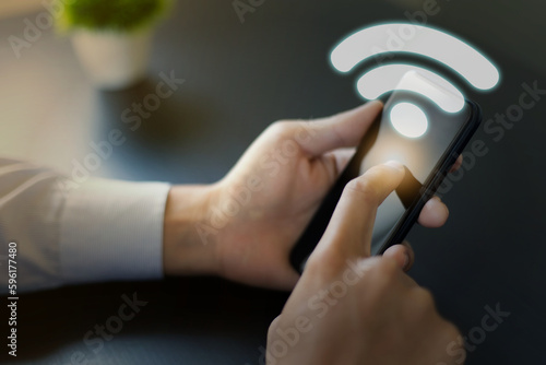 スマートフォンのクリックとWi-Fiのマーク clicking smartphone and wifi icon