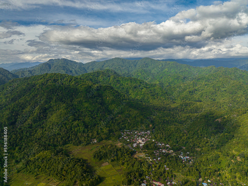 Fototapeta premium Mountain range and mountain slopes with rainforest. Sumatra, Indonesia.