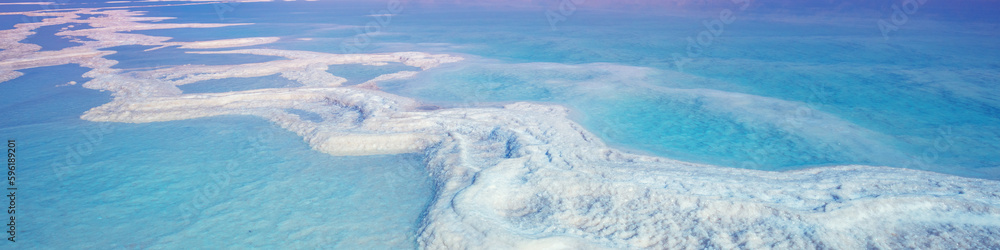 The texture of the Dead Sea. Seascape. Salty seashore. Nature background. Israel The texture of the Dead Sea. Seascape. Salty seashore. Nature background. Israel
