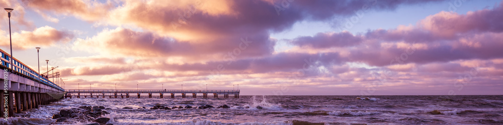 Pier and sea at sunset