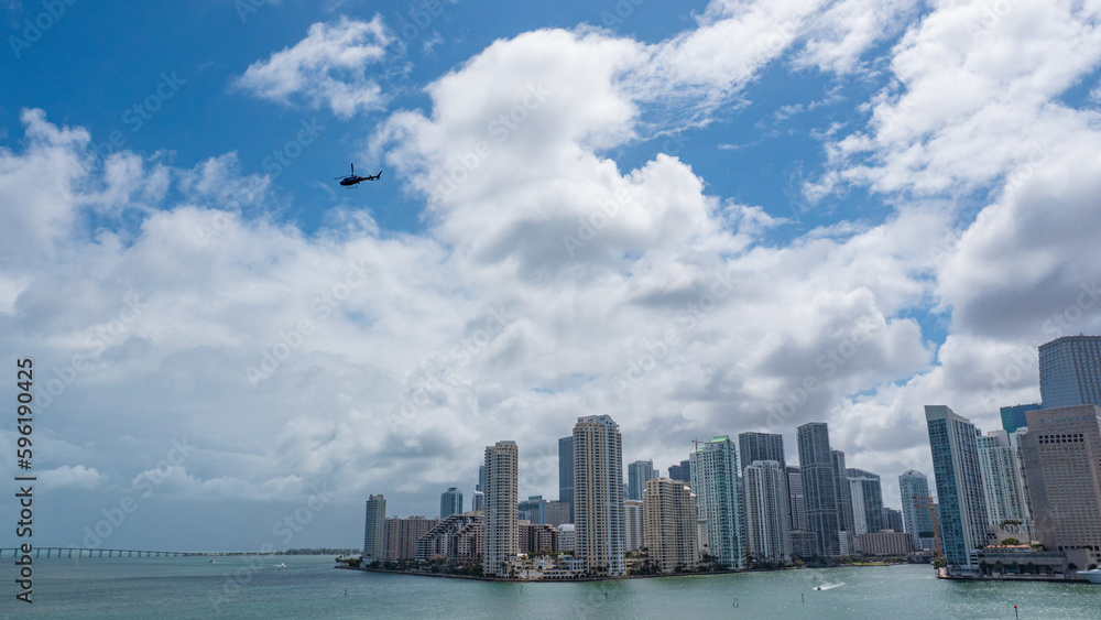 Obraz premium helicopter and miami skyscraper building. skyscraper building with helicopter view.