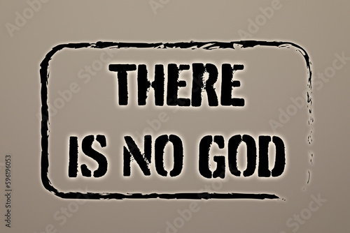 Text There Is No God on greyish beige background, stamp style photo