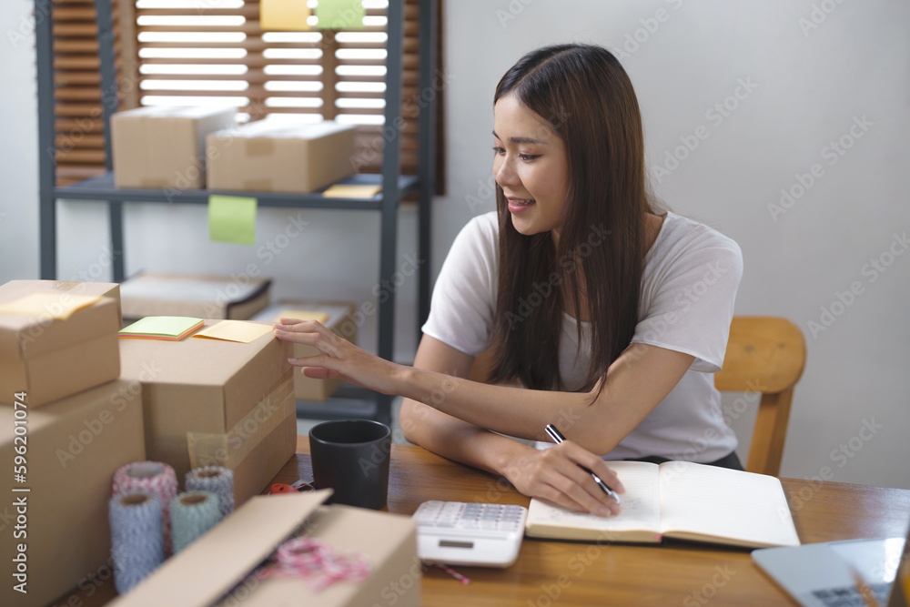 ecommerce and delivery service concept. Asian woman retail online. ecommerce and delivery service concept. Asian woman retail online.
