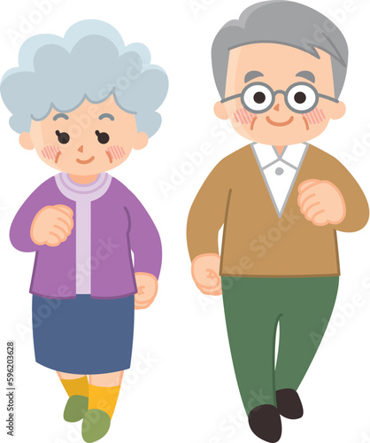 正面に向かって歩く高齢者　シニア夫婦