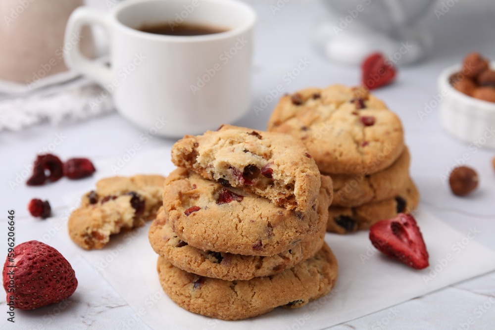 Cookies with freeze dried fruits and nuts on white marble table, closeup Cookies with freeze dried fruits and nuts on white marble table, closeup