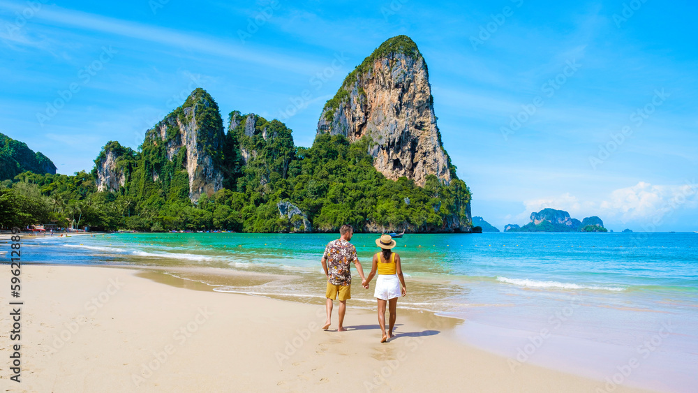 Obraz premium Railay beach Krabi Thailand, couple of men and women on the beach of tropical beach of Railay Krabi
