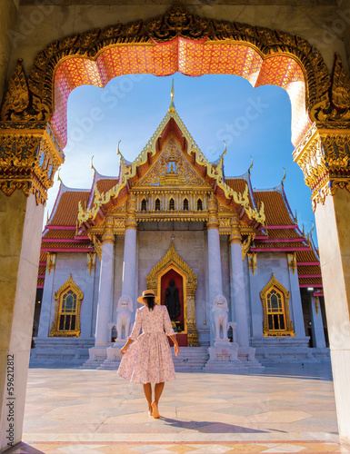 women walking at Wat Benchamabophit temple in Bangkok Thailand, The Marble temple in Bangkok