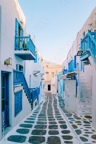 Fototapeta Naklejka Na Ścianę i Meble -  Mykonos Greece , colorful streets of the old town of Mykonos with tourist in the street