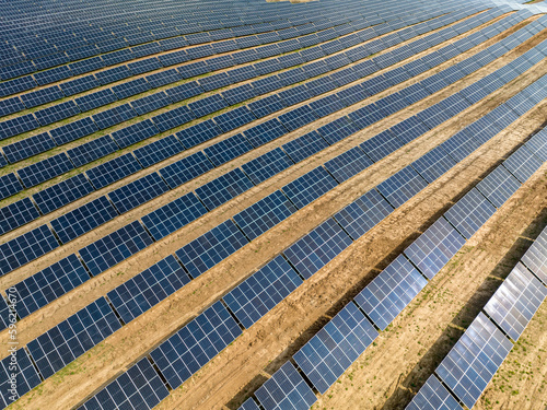 Wallpaper Mural Drone photography of solar farm and green fields, solar power plant in Poland, aerial photo photovoltaic power station on sunny day Torontodigital.ca