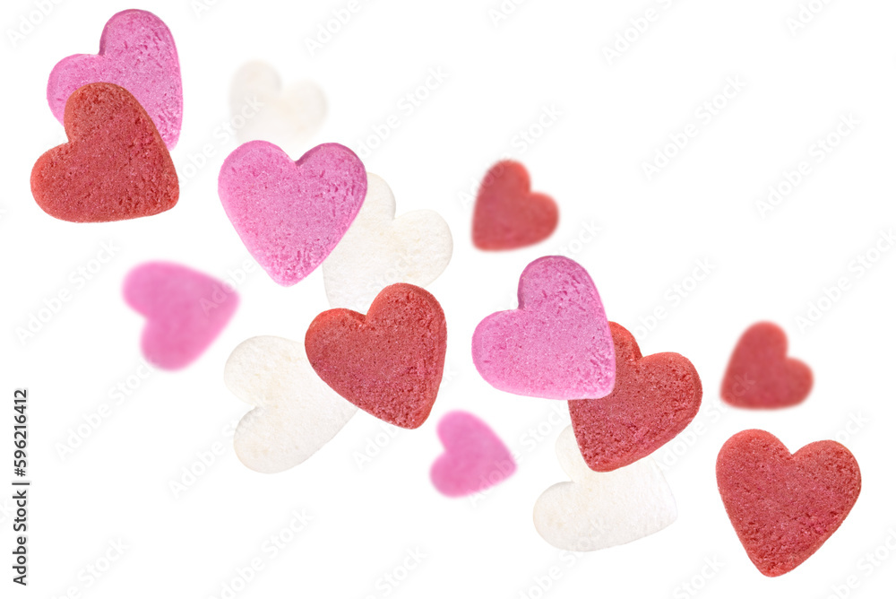 Levitation of sugar hearts isolated on a transparent background.