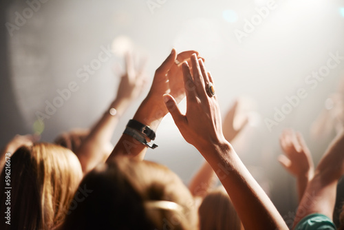 Fotografija Clapping crowd, party and people at a concert for celebration, performance and watching a band