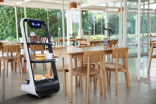 Autonomous waiter robot working in restaurant, Artificial intelligence 5G technology concept