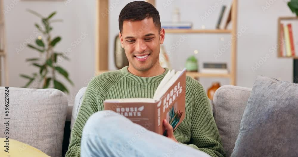 Happy, man and reading a book about plants for learning, knowledge and education on care. Smile, relax and a guy enjoying studying about caring for a plant, interesting facts and tips at home Happy, man and reading a book about plants for learning, knowledge and education on care. Smile, relax and a guy enjoying studying about caring for a plant, interesting facts and tips at home