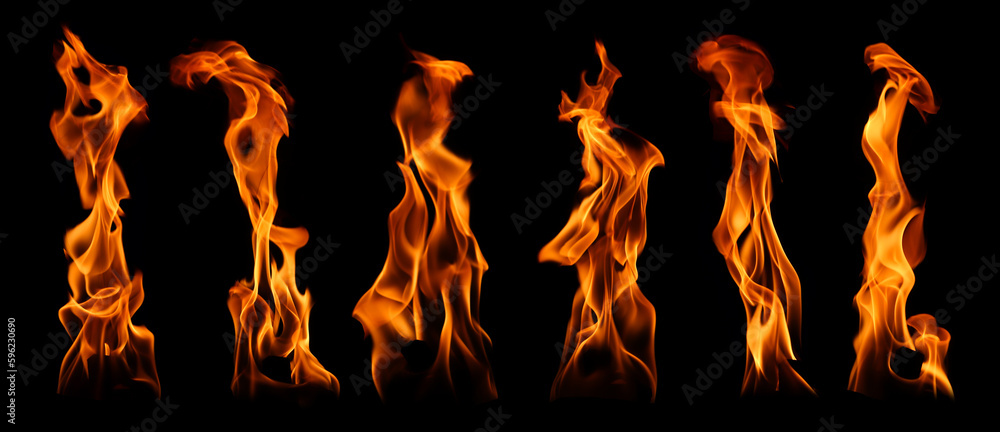 Burning flame isolated on dark background Burning flame isolated on dark background