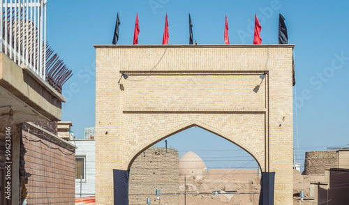 Gate on a street of Old Town in Kashan city, Iran photo