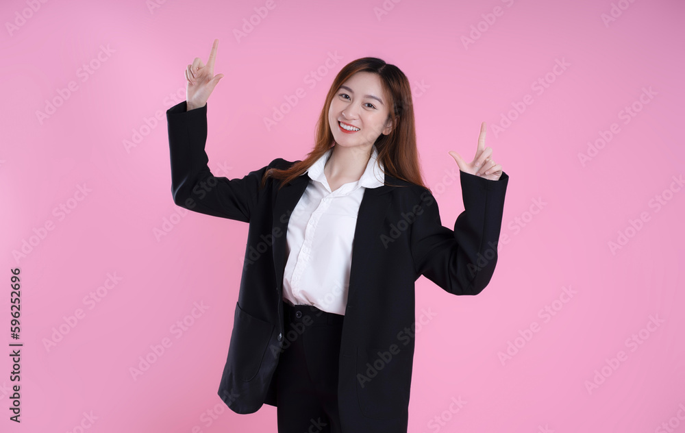 image of businesswoman posing on pink background