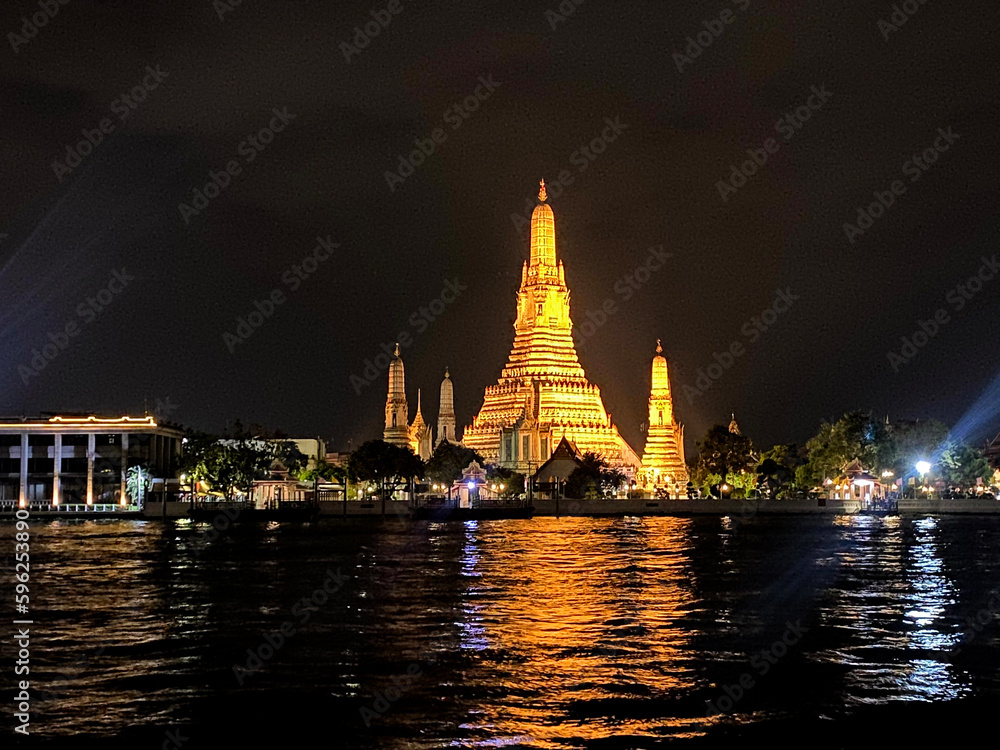 The visiting card of the capital of Thailand is the Buddhist temple Wat Arun, Temple of Dawn, which is located on the banks of the Chao Phraya River The visiting card of the capital of Thailand is the Buddhist temple Wat Arun, Temple of Dawn, which is located on the banks of the Chao Phraya River