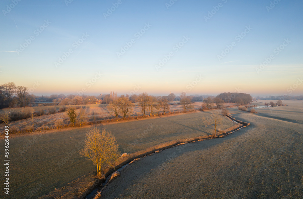 Netherlands, Gelderland, Floodlands and canal on cold morning Netherlands, Gelderland, Floodlands and canal on cold morning