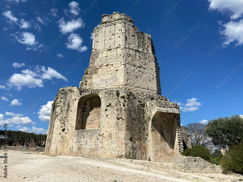 Nîmes, France - 04 19 2023: The Gardens of La Fontaine. View of the Magne tower.