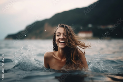 woman swimming on the sea and having fun